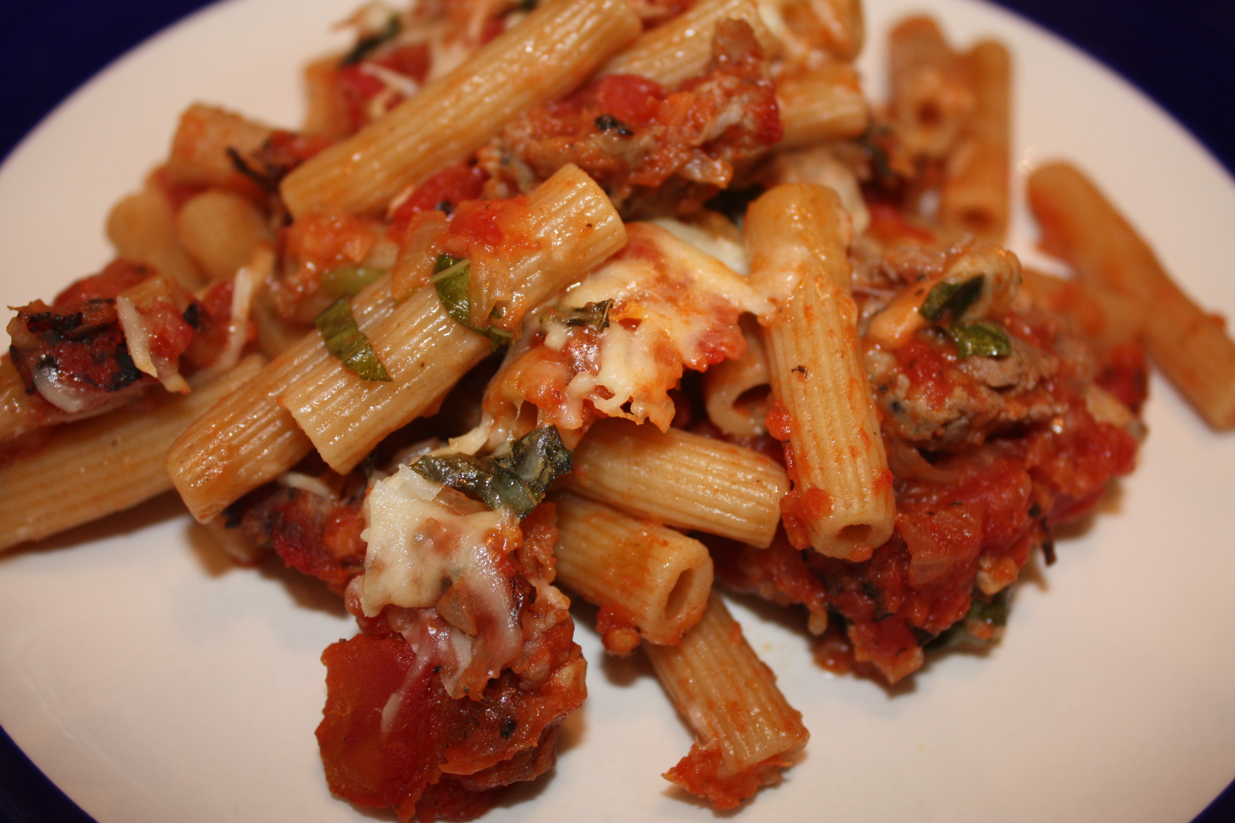 Pasta Baked with Sausage, Tomatoes and Cheese