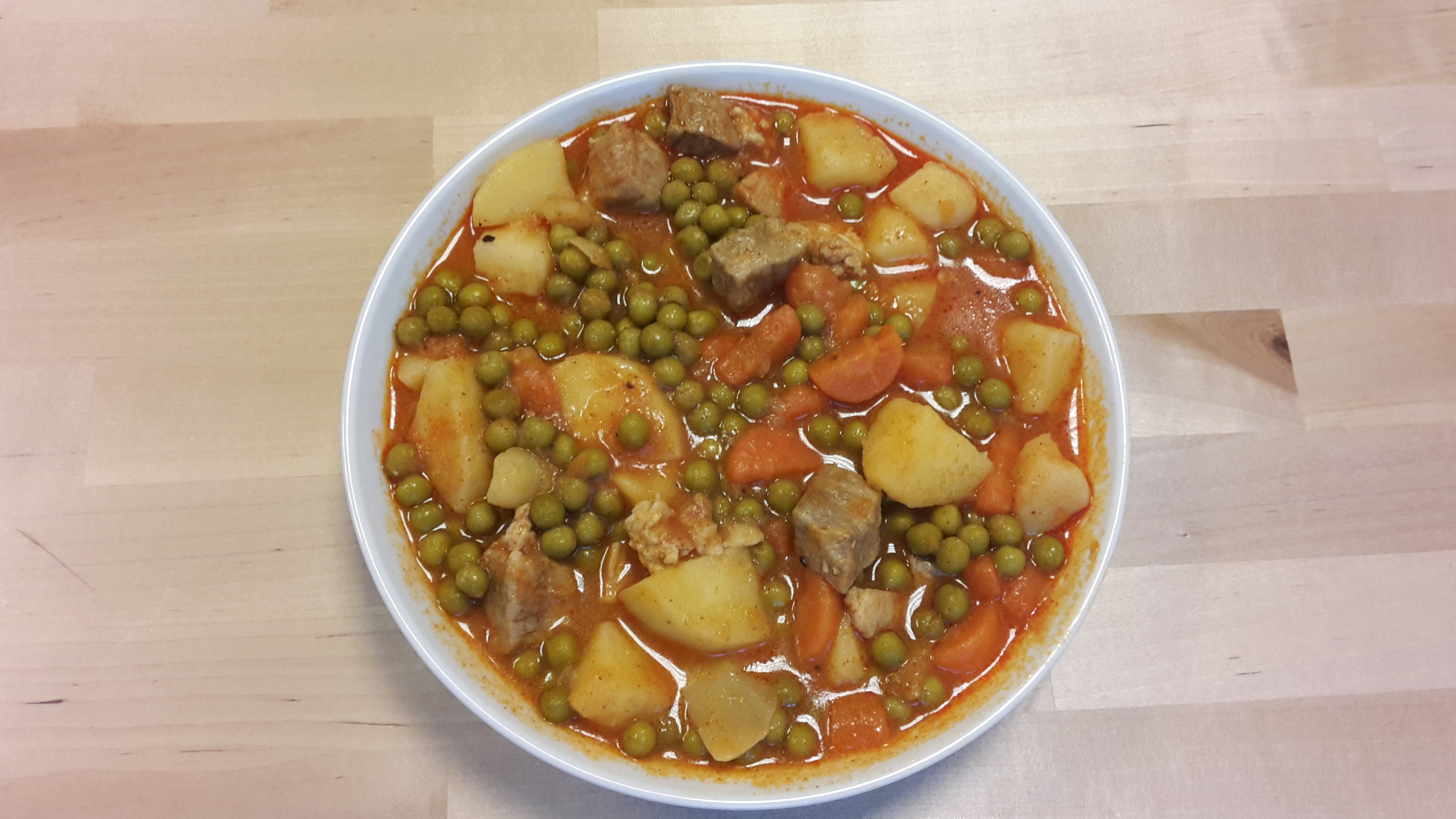Pork stew with peas